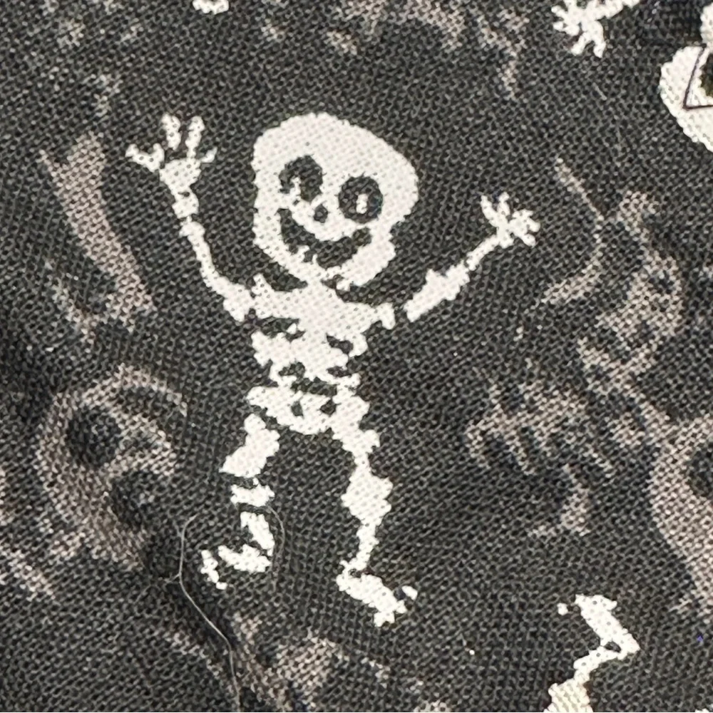 Black & White Skeleton fabric on an Upcycled Cherokee Denim Jacket., XL 14 / 16